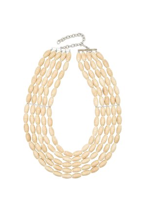 Multi-strand necklace featuring oval, cream-colored beads with a smooth texture, finished with a silver-tone clasp and chain.