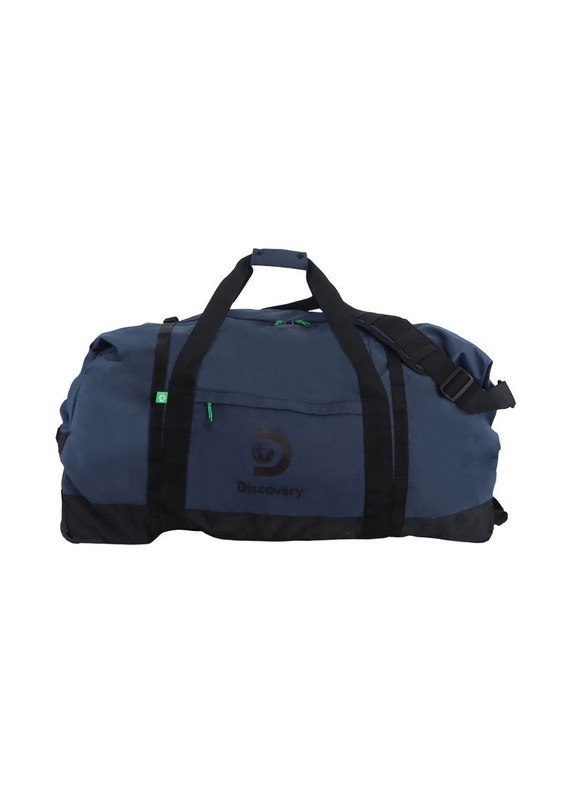 Bolso de deporte azul marino con detalles en negro, que cuenta con asas dobles, correa ajustable y un bolsillo frontal con cremallera verde y logotipo.
