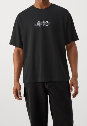 T-shirt con stampa - black