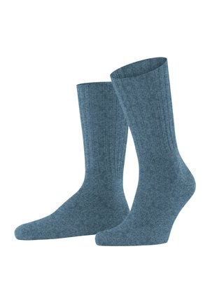 Socken aus Baumwollmischung in einem mittleren Blau, mit geripptem Muster, in knöchelhafter Länge und verstärkten Akzenten an Ferse und Zehen.