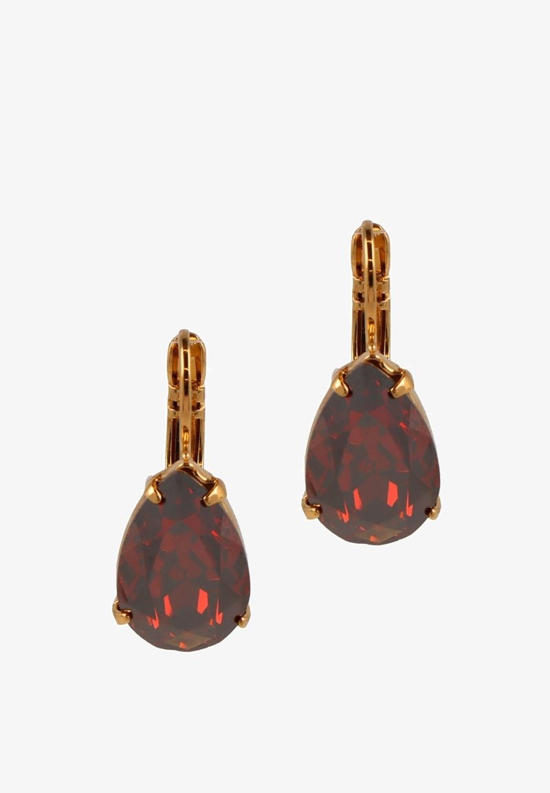 Gold-tone drop earrings featuring teardrop-shaped red stones, faceted for sparkle, secured with prong settings and a leverback design.