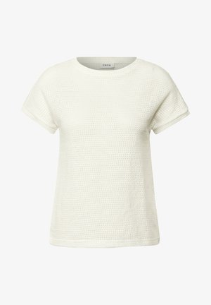 Haut blanc à manches courtes avec un design en gaufre texturé et un col rond. Tissu doux avec des manches retroussées, conçu pour un ajustement décontracté.