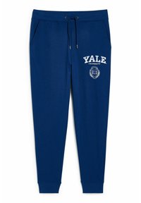 Navy blue sweatpants with a drawstring waist, side pockets, and printed white text "YALE UNIVERSITY" with an emblem on the left thigh.