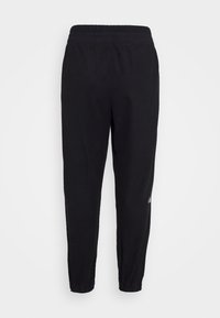 Black jogger pants with a stretch waistband, tapered legs, and elastic cuffs. Features a small logo detail on the side.