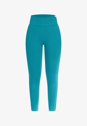 Legginsy w kolorze zielonym o wysokim stanie, bezszwowe, z szerokim ściągaczem w talii, dopasowane i sięgające do kostek.