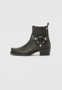 KORA CHELSEA - Korte laarzen - black