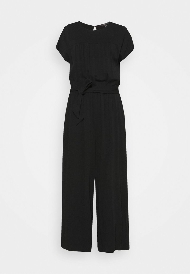 Combinaison noire à manches courtes avec jambes larges et ceinture en tissu nouée à la taille, avec un col rond et une fermeture à boutons dans le dos.