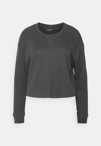 Felpa corta grigio scuro con texture a coste, maniche lunghe e collo rotondo. Presenta dettagli cuciti sul colletto.