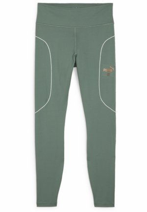 Leggings deportivos verdes hechos de material elástico, con costuras blancas y un logo dorado de Puma en el lado izquierdo.