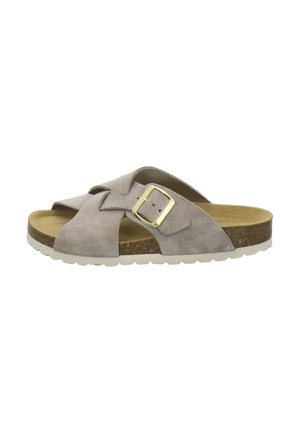 Beige suede slide sandal with wide crisscross straps, adjustable gold buckle, cork footbed, and white rubber sole.