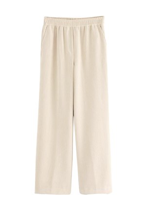Pantaloni ampi color beige chiaro con una texture a coste, dotati di una vita elastica e due tasche laterali.