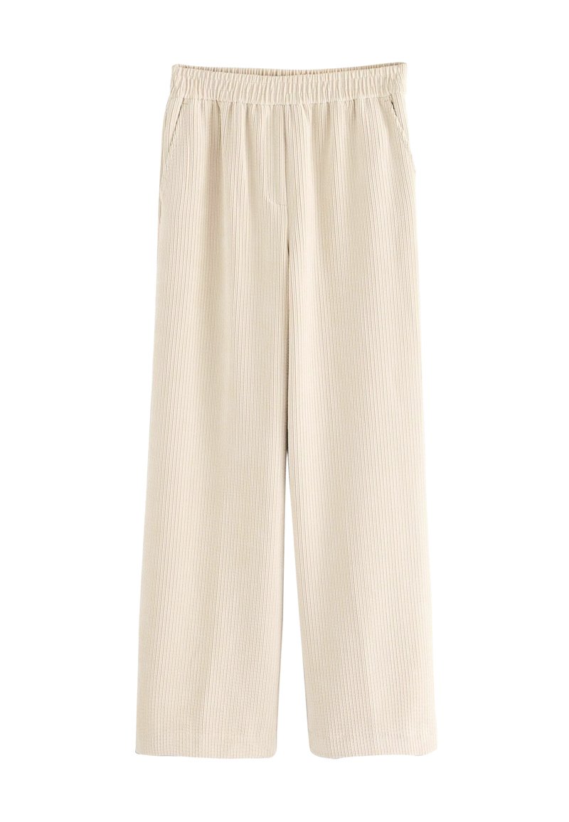 Pantalones de pierna ancha color beige claro con una textura acanalada, que cuentan con una cintura elástica y dos bolsillos laterales.