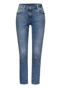 Džínové kalhoty střední výšky modré barvy s úzkým střihem, s knoflíkovým zapínáním, kapsami a jemným vyblednutím. Hladká textura a klasický design pěti kapes.