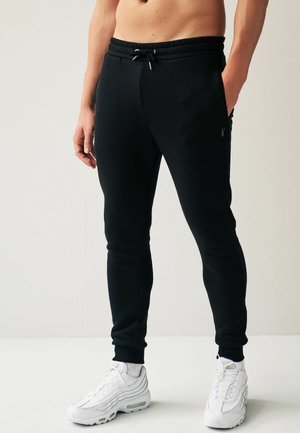 JOGGERS REGULAR FIT - Jogginghose - black