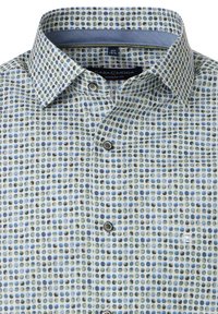 Patterned shirt with blue, green, and white polka dots. Features a button-down collar and grey accent on the inner collar. Modern fit design.