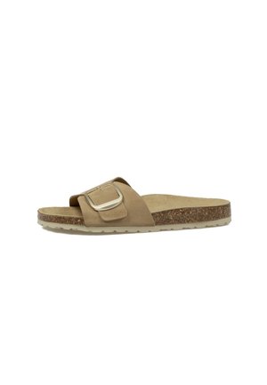 Sandalia beige tipo slide con tira ancha de ante, hebilla grande, plantilla de corcho y suela clara con dibujo, mostrada de perfil sobre fondo blanco.