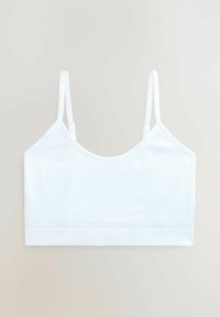 Balta medvilninė bralette su plonomis reguliuojamomis petnešėlėmis, apvaliu iškirpimu ir lygiu, elastingu paviršiumi. Be paminkštinimo ir laidų.