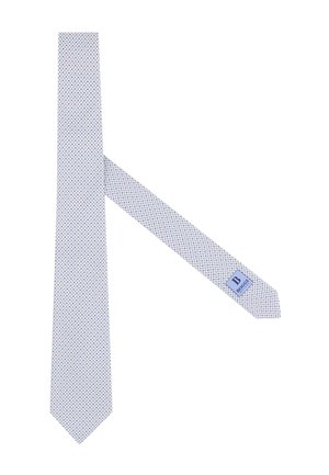 Jasnoniebieski jedwabny krawat z małym ciemnoniebieskim i srebrnym geometrycznym wzorem, metka przyszyta blisko wąskiego końca.