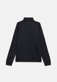 Black long-sleeve jacket with a high collar, shown from the back, featuring simple, smooth fabric and fitted cuffs.