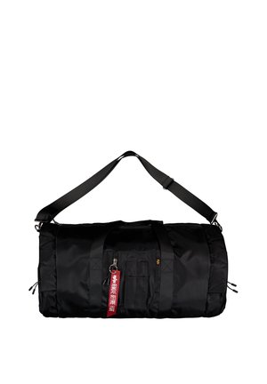 Borsa cilindrica nera con tracolla regolabile, maniglie per il trasporto, tasca frontale con zip e targhetta portachiavi in tessuto rosso.