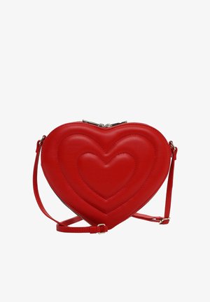 Red heart-shaped crossbody bag with stitched double heart design and adjustable strap on white background.