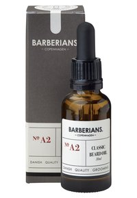Bouteille en verre ambre avec un capuchon compte-gouttes noir, étiquetée "Huile à barbe classique" 30 ml, emballée dans une boîte sombre et minimaliste.