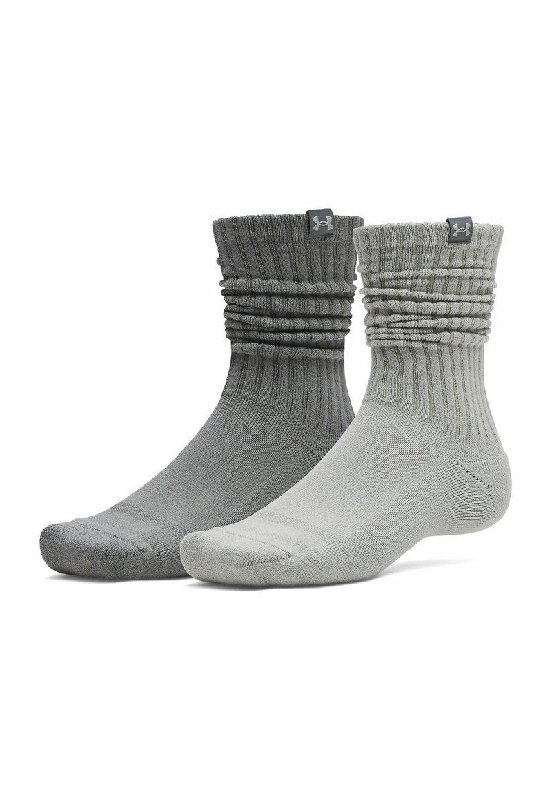 Dve pari čevljevih nogavic v različnih odtenkih sive. Rebrasta tekstura, z zloženim manšetom in logotipom na vrhu.