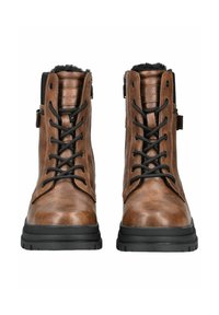 Bottines en cuir marron avec des lacets noirs et une semelle en caoutchouc. Elles disposent d'un intérieur doux et pelucheux ainsi que d'une fermeture éclair sur le côté pour un enfilage facile.