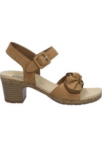 Bruine leren hak sandaal met een geknoopt ontwerp op de teen en een verstelbare enkelband. Kurken tussenzool met een gestructureerde zool.