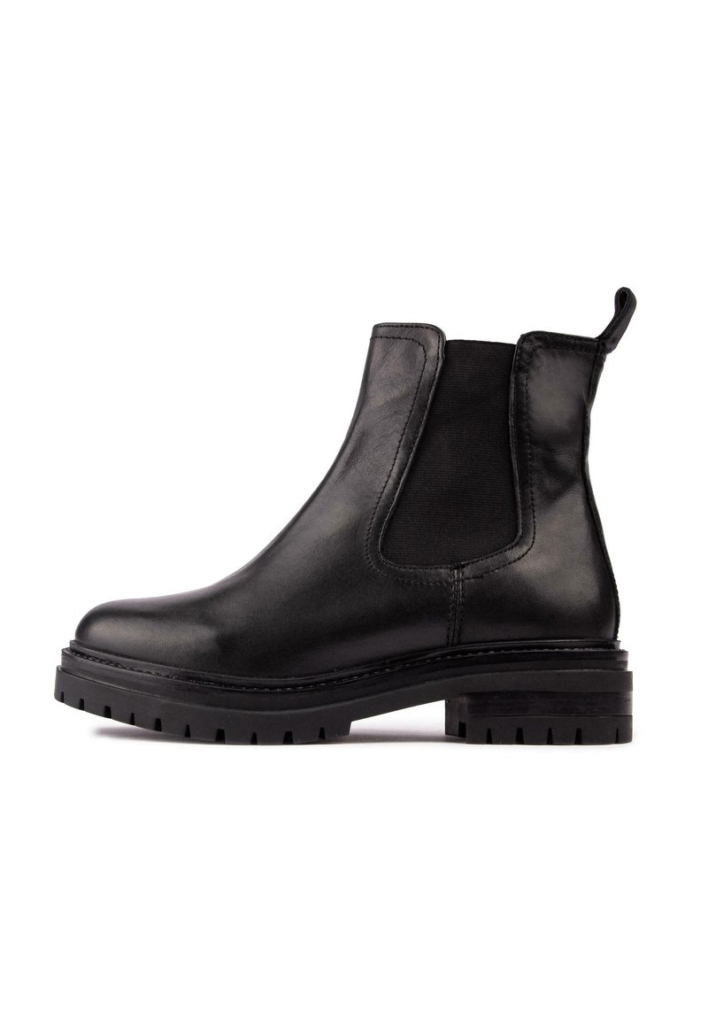 Black leather Chelsea boot featuring elastic side panels, a pull tab, and a chunky textured rubber sole. Smooth finish with stitched accents.