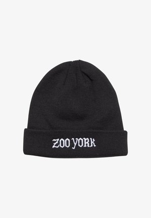 Black knitted beanie featuring a folded cuff and white embroidered text, reading "ZOO YORK," on the front. Soft texture, snug fit.