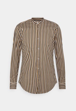 Camicia a maniche lunghe con righe verticali in nero, marrone e crema. Realizzata in tessuto liscio con colletto e polsini con bottoni.