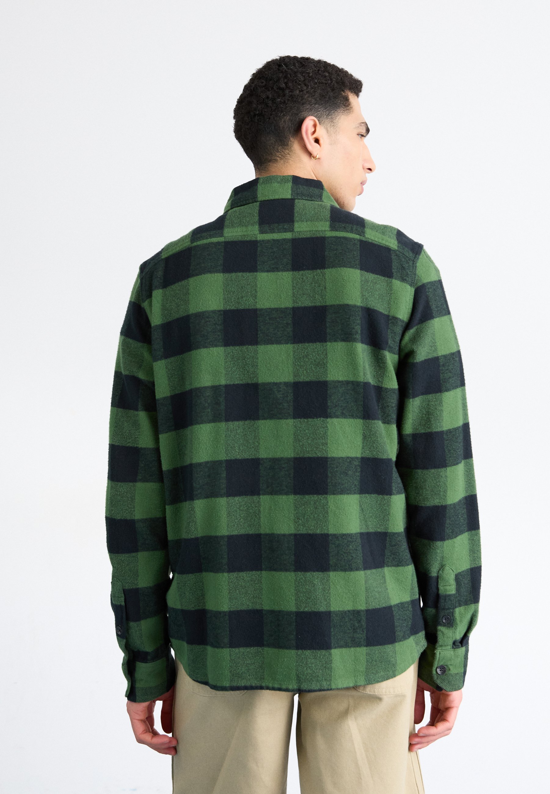 black and pine green shirts