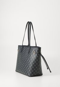 Navy tote bag with decorative pattern, featuring two long handles and drawstring closure, displayed against a neutral background.