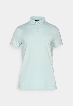 Hellgrünes Polohemd aus glattem Stoff. Mit klassischem Kragen, Knopfleiste und einem geometrischen Strukturmuster auf dem Ärmel.