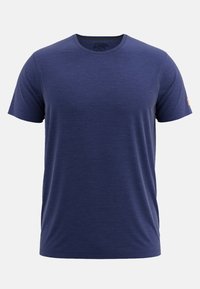 T-shirt a maniche corte di colore blu navy realizzato in tessuto morbido. Presenta un collo rotondo e una leggera texture. Piccolo logo sulla manica.