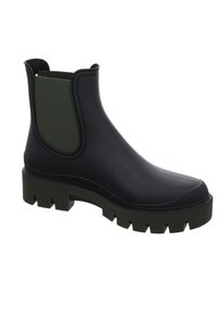 Botín de goma negro hasta el tobillo con panel lateral elástico verde, suela gruesa y con relieve, y punta redondeada. Textura lisa, diseño minimalista.