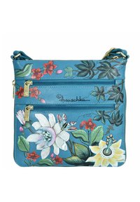 Blaues Leder-Crossbody-Täschchen mit floralem Design in Pink, Weiß und Grün. Besitzt zwei mit Reißverschluss gesicherte Fächer und eine dekorative Signatur.