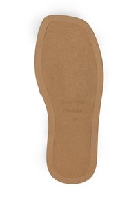Brown textured shoe sole with a smooth finish, featuring a slightly raised border and embossed brand information near the heel.
