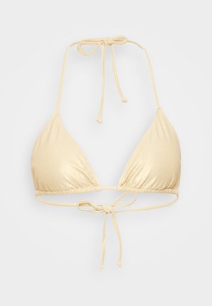 TrikotASTni bikini vrh v sijoči, svetlo bež tkanini. Ima tanke vezice za zavezovanje okoli vratu in hrbta. Gladka tekstura z nabranimi detajli.