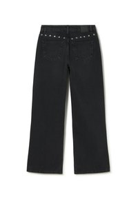 Jeans anchos negros con dos bolsillos traseros y tachuelas plateadas a lo largo de la cinturilla, exhibidos planos sobre un fondo blanco.