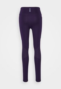 Purple athletic leggings with a high waistband, featuring mesh panel accents and decorative perforations on the lower legs. Smooth material.