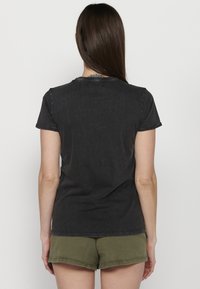 Koroshi SHORT SLEEVE - Apdrukāts T-krekls - black