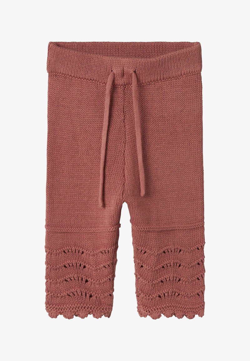 Roze pletene kratke hlače s elastičnim pojasom, s čipkastim obrubom i složenim čipkastim uzorkom na dnu. Mekan materijal, lagana tkanina.