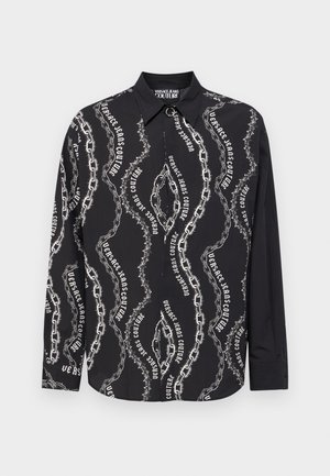 Schwarz langärmliges Shirt mit Kettenmuster und "Versace Jeans Couture"-Text, aus einem glatten, leichten Stoff gefertigt.