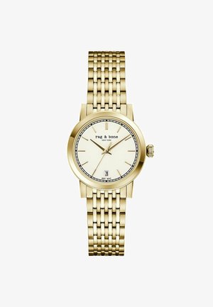 Ceas de mână Rag & Bone cu ton auriu, brățară cu zale, cadran alb, marcaje orare minimaliste, trei ace și fereastră pentru dată la ora 6.