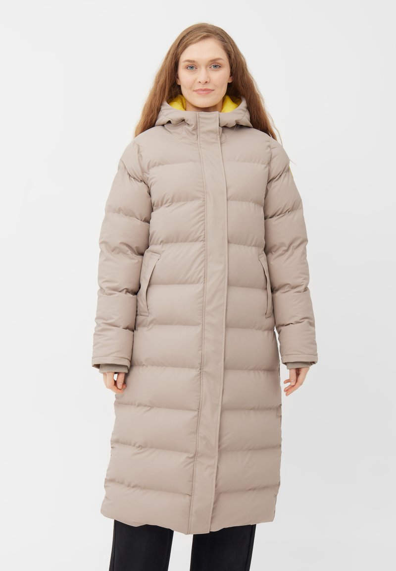 Light beige long puffer coat with horizontal quilted sections, two side pockets, hood, yellow lining, and fitted cuffs.