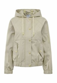 Jasno beżowa kurtka z kapturem, pikowana, z guzikami w kolorze złota, elastycznymi mankietami i dwiema bocznymi kieszeniami. Gładka faktura materiału.