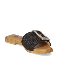 Black woven slide sandal features a textured upper and a flat tan sole, accented with a metallic buckle embellished with small clear stones.