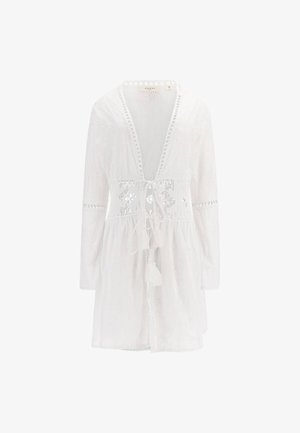 White, long-sleeve cover-up featuring a front tie closure, lace accents, and embroidered texture with a loose fit and decorative tassels.